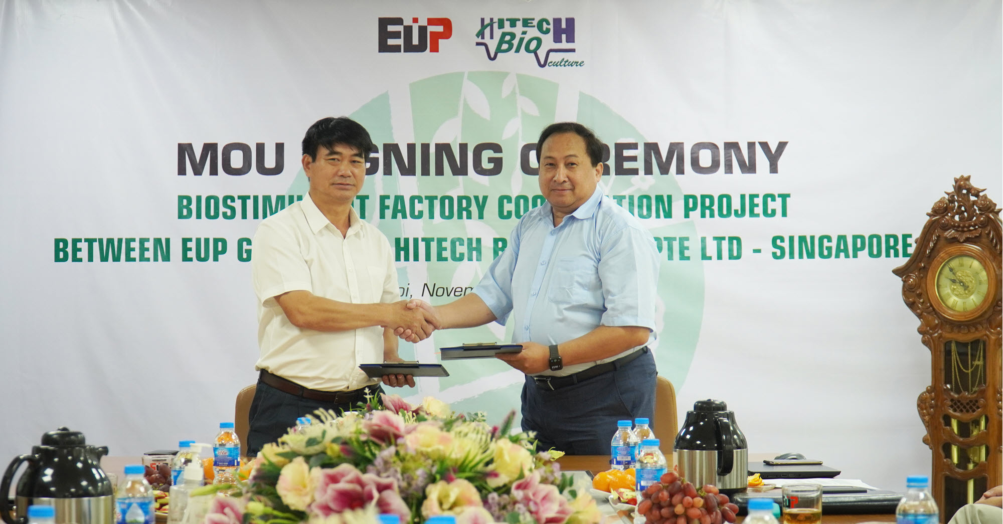 Mr. Hoang Quoc Huy and Drs. William shake hands
